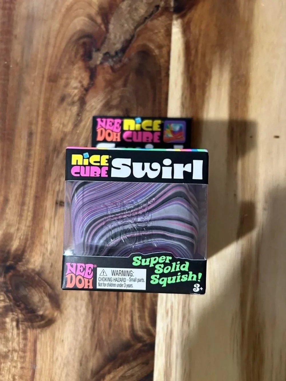 Nee Doh Nice Cube Swirl Purple & Gray Super Solid Squish Medium in size
